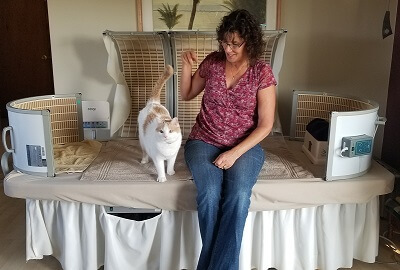 Mara with her Cat Bolt on the SOQI Bed